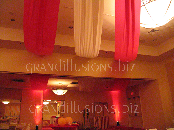 ceiling draping for tent with uplighting decorations