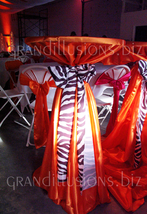 tall cocktail tables orange cover zebra chair tie wedding reception decorating