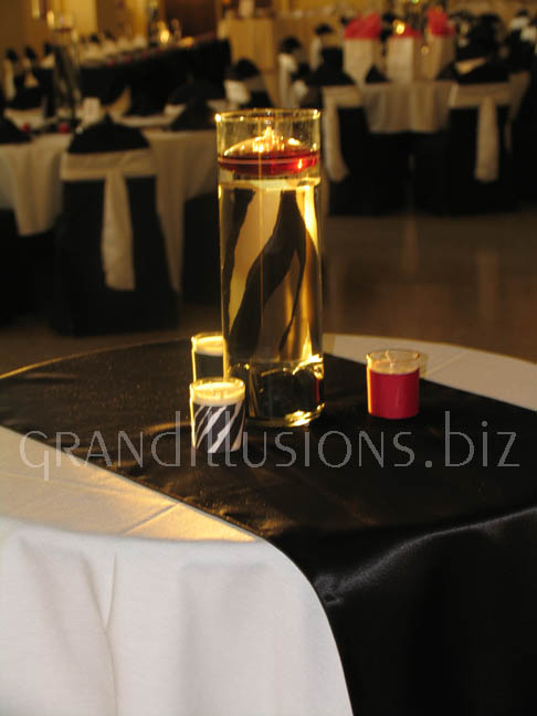 tall cylinder with zebra with floating calnedar wedding reception