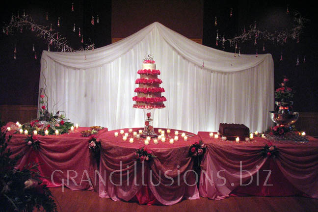 wedding cake table and backdrop in pink and crystals Divot's Norfolk Nebraska