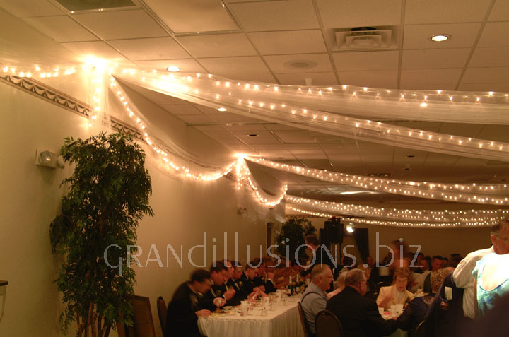 wedding reception tulle and lights on ceiling